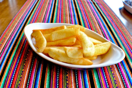 Papas Fritas - Steak cur fries made from the yellow potato.