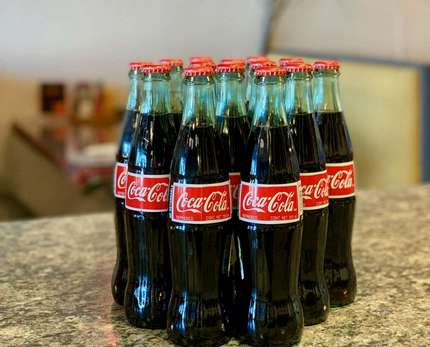 Coca Cola products including glass bottle Mexican Coke.